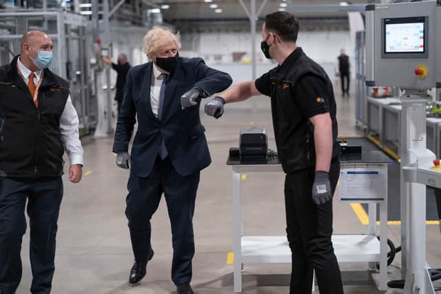 Britain's Prime Minister Boris Johnson tours the facility with managing director Jeff Pratt (left) as he meets a member of staff during a visit to the UK Battery Industrialisation Centre in Coventry. Picture: AFP via Getty Images






West Midlands.
15th July 2021 (Photo by David Rose / POOL / AFP) (Photo by DAVID ROSE/POOL/AFP via Getty Images)