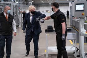 Britain's Prime Minister Boris Johnson tours the facility with managing director Jeff Pratt (left) as he meets a member of staff during a visit to the UK Battery Industrialisation Centre in Coventry. Picture: AFP via Getty Images






West Midlands.
15th July 2021 (Photo by David Rose / POOL / AFP) (Photo by DAVID ROSE/POOL/AFP via Getty Images)