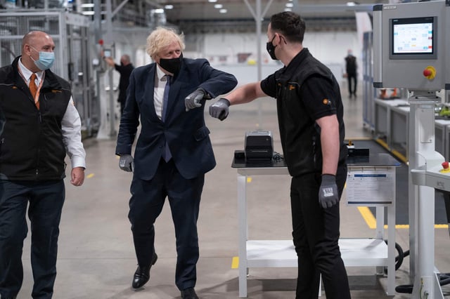 Britain's Prime Minister Boris Johnson tours the facility with managing director Jeff Pratt (left) as he meets a member of staff during a visit to the UK Battery Industrialisation Centre in Coventry. Picture: AFP via Getty Images
West Midlands.
15th July 2021 (Photo by David Rose / POOL / AFP) (Photo by DAVID ROSE/POOL/AFP via Getty Images)