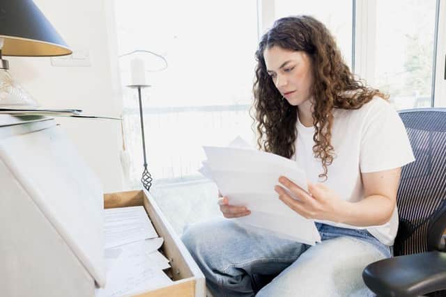 A lady looking for important documents