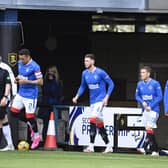 Rangers players enter the pitch during the Scottish Premiership match between Livingston and Rangers at the Tony Macaroni Arena on May 12, 2021, in Livingston, Scotland.  (Photo by Rob Casey / SNS Group)