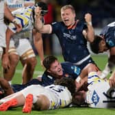 Joy for Edinburgh's Cammy Hutchison, top, and Paddy Harrison after the latter's late, late try secured the win over Zebre. (Photo by Mark Scates / SNS Group)