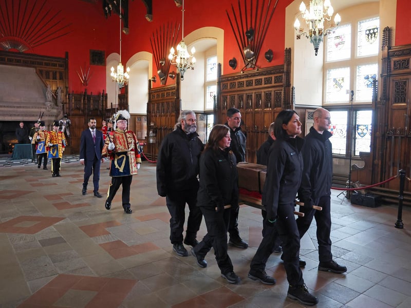 The Stone of Destiny, which is also known as the Stone of Scone, is carried out of the Great Hall in Edinburgh Castle before onward transportation to be placed beneath the Coronation Chair at Westminster Abbey for the coronation of King Charles III. The stone is returning to England for the first time since 1996