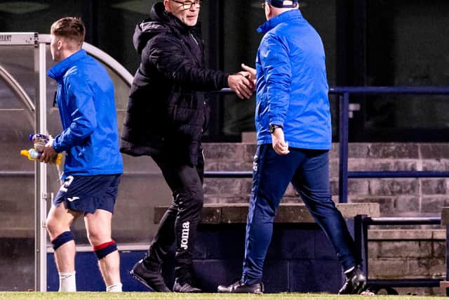 Dunfermline manager John Hughes shakes hands with Raith Rovers boss John McGlynn after the 0-0 draw at Stark's Park. (Photo by Alan Rennie / SNS Group)