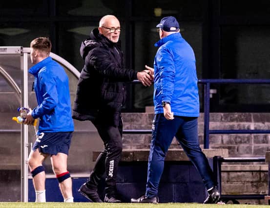 Dunfermline manager John Hughes shakes hands with Raith Rovers boss John McGlynn after the 0-0 draw at Stark's Park. (Photo by Alan Rennie / SNS Group)
