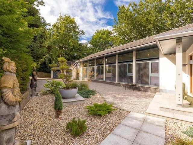 A stunning indoor mosaic-tiled swimming pool is one of the eye-catching features of this five bedroom property stituated between the Cammo Estate Nature Reserve and the river Almond Walkway on the outskirts of Edinburgh. You'll need a minimum of £1.65 million to take the plunge.