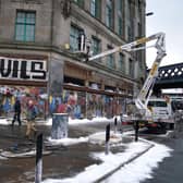 Set Dressers dress the set in Glasgow, for what is believed to be the film set of the new Batgirl movie (Photo: Andrew Milligan/PA Wire).