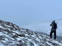 A stalker from NatureScot surveys the landscape at Loch Choire. PIC: NatureScot.