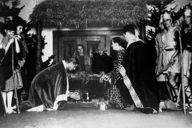 Prince Philip (centre left, kneeling) performing as King Melchior in a nativity play at Gordonstoun School, Elgin.