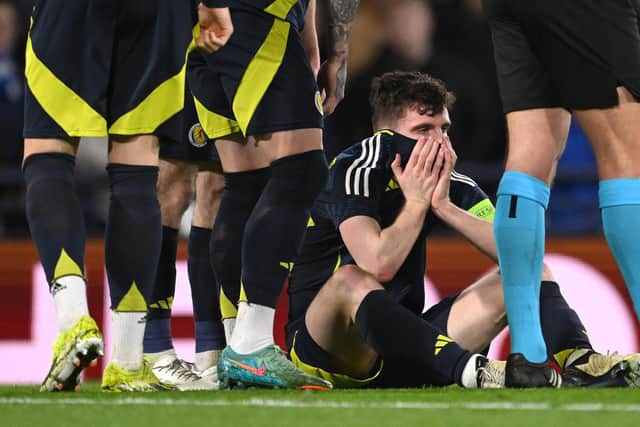 Scotland captain Andrew Robertson reacts after picking up an injury during the 1-0 defeat to Northern Ireland at Hampden. (Photo by Stu Forster/Getty Images)