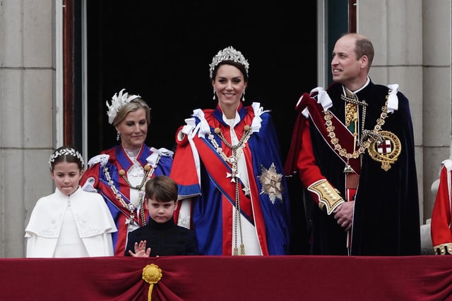 (Left to right) Princess Charlotte, the Duchess of Edinburgh, Prince Louis, the Princess of Wales and the Prince of Wales on the balcony of Buckingham Palace, London, following the coronation.