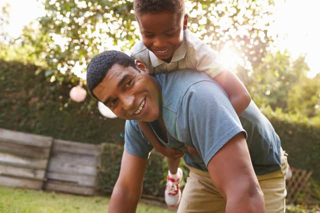 Many people make a special effort to visit their dad on Father's Day, often taking a card and perhaps a gift, while activities are also common. (Pic: Shutterstock)