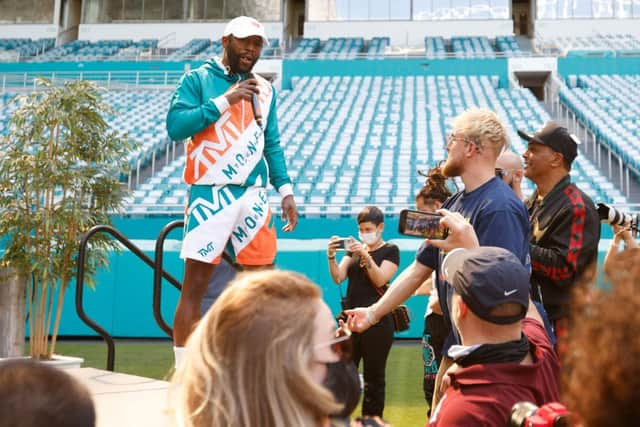 As part of the media event, Jake Paul had attempted to untie Mayweather’s shoes as he spoke onstage (Photo: Cliff Hawkins/Getty Images)