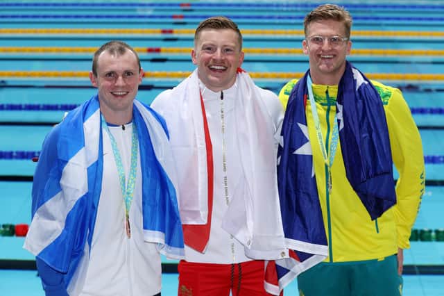 Bronze medalist, Ross Murdoch of Team Scotland, Gold medalist, Adam Peaty of Team England and Silver medalist, Sam Williamson of Team Australia pose with their medals during the medal ceremony for the Men's 50m Breaststroke Final on day five of the Birmingham 2022 Commonwealth Games at Sandwell Aquatics Centre on August 02, 2022 in Smethwick, England. (Photo by Clive Brunskill/Getty Images)