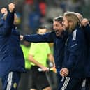 Scotland head coach Steve Clarke (left) celebrates with his staff after the goalless draw with Ukraine at the Stadion Cracovii in Krakow, Poland.