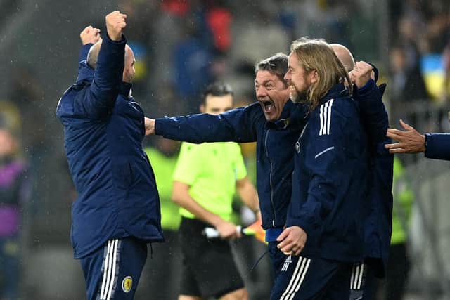 Scotland head coach Steve Clarke (left) celebrates with his staff after the goalless draw with Ukraine at the Stadion Cracovii in Krakow, Poland.