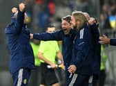 Scotland head coach Steve Clarke (left) celebrates with his staff after the goalless draw with Ukraine at the Stadion Cracovii in Krakow, Poland.
