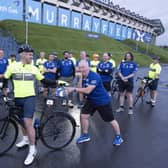 Scottish rugby legend Kenny Logan, on bike, and former Rangers and Scotland footballer Ally McCoist, right, before setting off from Murrayfield in Edinburgh with a team of celebrities on a 700-mile endurance challenge to Paris to raise money for the motor neurone disease charity set up by the late Doddie Weir. Photo: Mark F Gibson/PA Wire