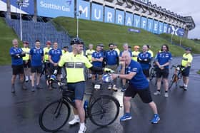 Scottish rugby legend Kenny Logan, on bike, and former Rangers and Scotland footballer Ally McCoist, right, before setting off from Murrayfield in Edinburgh with a team of celebrities on a 700-mile endurance challenge to Paris to raise money for the motor neurone disease charity set up by the late Doddie Weir. Photo: Mark F Gibson/PA Wire