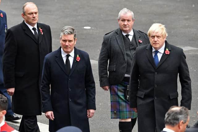 Does Ian Blackford, second right, think Boris Johnson is reason enough to dismantle the UK? (Picture: Justin Tallis/AFP via Getty Images)