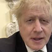 Boris Johnson joked about being "under house arrest" as he continues to self-isolate.