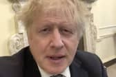 Boris Johnson joked about being "under house arrest" as he continues to self-isolate.