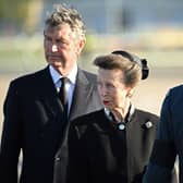 Princess Anne, Princess Royal (centre) and her husband Vice Admiral Timothy Laurence (left) watch as pallbearers from the Queen's Colour Squadron of the Royal Air Force (RAF) carry the coffin of Queen Elizabeth II. Picture: Paul Ellis - WPA Pool/Getty Images