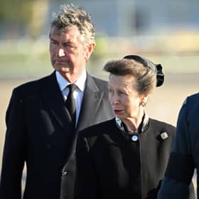 Princess Anne, Princess Royal (centre) and her husband Vice Admiral Timothy Laurence (left) watch as pallbearers from the Queen's Colour Squadron of the Royal Air Force (RAF) carry the coffin of Queen Elizabeth II. Picture: Paul Ellis - WPA Pool/Getty Images