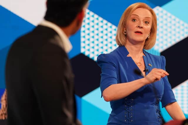 Rishi Sunak and Liz Truss taking part in the BBC Tory leadership debate, Our Next Prime Minister, presented by Sophie Raworth, a head-to-head debate at Victoria Hall in Hanley, Stoke-on-Trent, between the Conservative party leadership candidates. Picture date: Monday July 25, 2022.