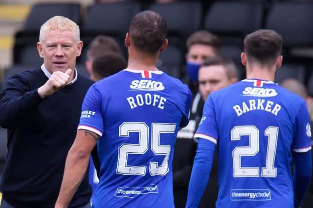 Gary Holt, manager of Livingston interacts with Kemar Roofe after the Scottish Premiership match between Livingston and Rangers at Tony Macaroni Arena on August 16, 2020. (Photo by Willie Vass/Pool via Getty Images)