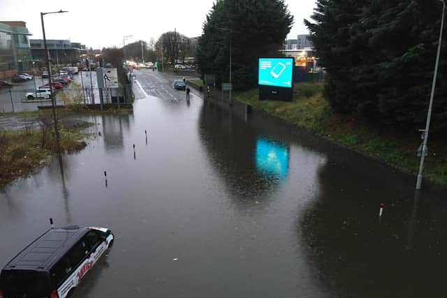 Cars were submerged at the busy junction
Photo: Helen Todd