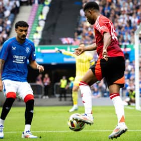 ​Jefté, left, in action for Rangers against Manchester United in a pre-season friendly (Picture: Ash Donelon/Manchester United via Getty Images)