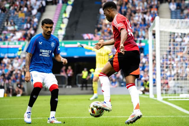Jefté, left, in action for Rangers against Manchester United in a pre-season friendly (Picture: Ash Donelon/Manchester United via Getty Images)