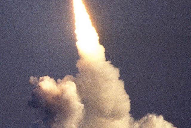 Undated handout file photo issued by the Ministry of Defence of the test firing of a Trident missile.
