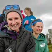 Ultra-runner Jamie Aarons, 43, celebrating with supporters at the end of the trek. Picture: Andy Stark/Stark Images/PA Wire