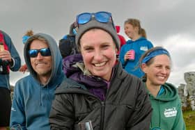 Ultra-runner Jamie Aarons, 43, celebrating with supporters at the end of the trek. Picture: Andy Stark/Stark Images/PA Wire