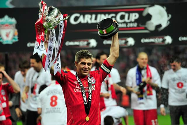 Steven Gerrard, pictured holding aloft the English League Cup after Liverpool's 2012 final win against Cardiff City at Wembley, says cup competitions have given him the most satisfying moments of his career. (Photo by Glyn Kirk/AFP via Getty Images)