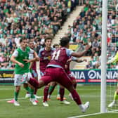 Aston Villa's Ollie Watkins scores a header to make it 2-0 over Hibs (Photo by Ross Parker / SNS Group).