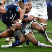 Scotland centre Huw Jones grapples for the ball with France's Gael Fickou during the Six Nations defeat in Paris. (Photo by ANNE-CHRISTINE POUJOULAT/AFP via Getty Images)