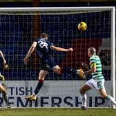 Jordan White heads Ross County into the lead in Dingwall. Picture: SNS