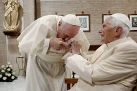 Pope Francis, left, during a visit to Pope Benedict XVI at his residence of the Mater Ecclesiae Monastery in the Vatican in 2020.