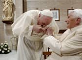 Pope Francis, left, during a visit to Pope Benedict XVI at his residence of the Mater Ecclesiae Monastery in the Vatican in 2020.