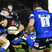 Glasgow Warriors' Sione Tuipulotu tries to barrel through the Bath defence during the 19-19 draw at Scotstoun.