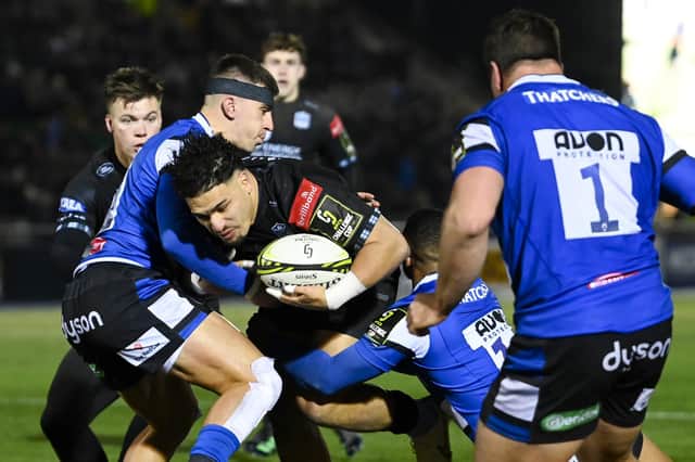 Glasgow Warriors' Sione Tuipulotu tries to barrel through the Bath defence during the 19-19 draw at Scotstoun.