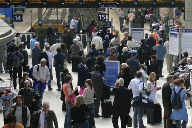 Commuters at Waverley Station. The shift to hybrid working this week will lead to a long-term shift away from commuters and office worker heading to city centres. PIC: Craig Stephen.