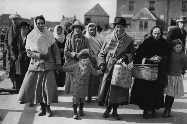 Islanders get ready to board SS Marloch 100 years ago to emigrate as part of a controversial scheme to create a new Catholic settlement in Alberta, Canada.  (Photo by Hulton Archive/Getty Images)