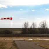 Strong winds can make driving unpredictable, especially on open roads or when overtaking larger vehicles so you should reduce your speed to stay in control.