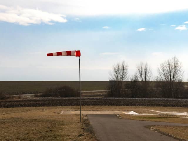 Strong winds can make driving unpredictable, especially on open roads or when overtaking larger vehicles so you should reduce your speed to stay in control.