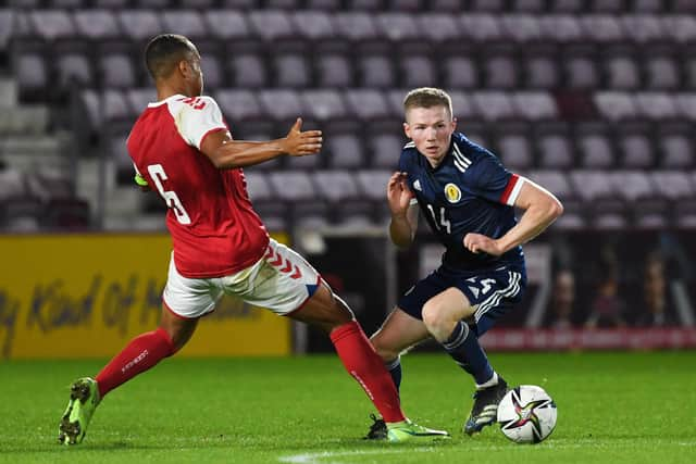 Scotland's Stephen Kelly competes with Nikolas Nartey. (Photo by Craig Foy / SNS Group)