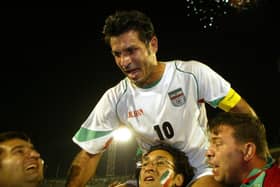 Former Asian player of the year and Iranian football legend Ali Daei has spoken in support of anti-government protests in Iran (Photo by Behrouz MEHRI / AFP)